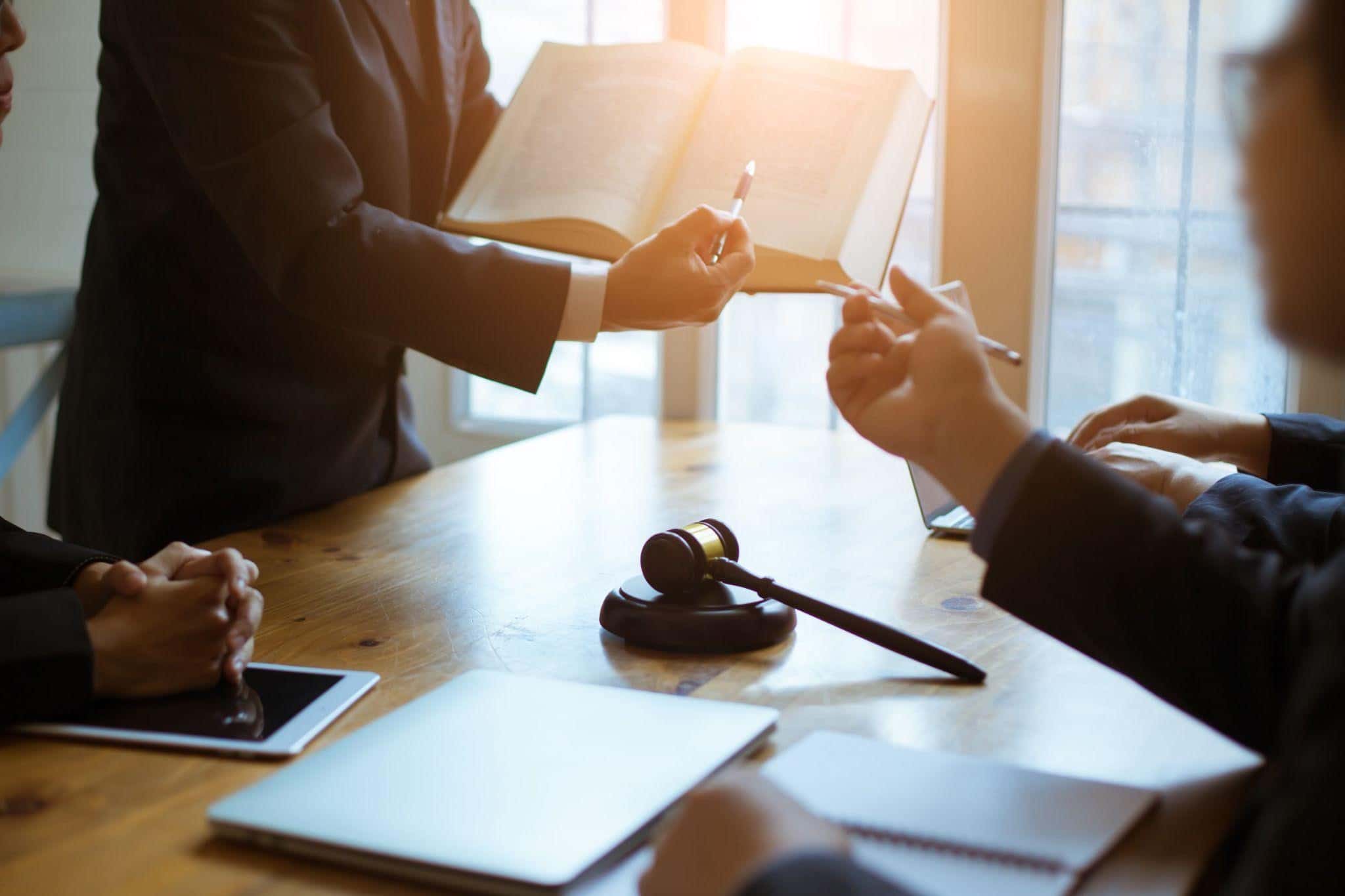 A bankruptcy lawyer meeting with a client